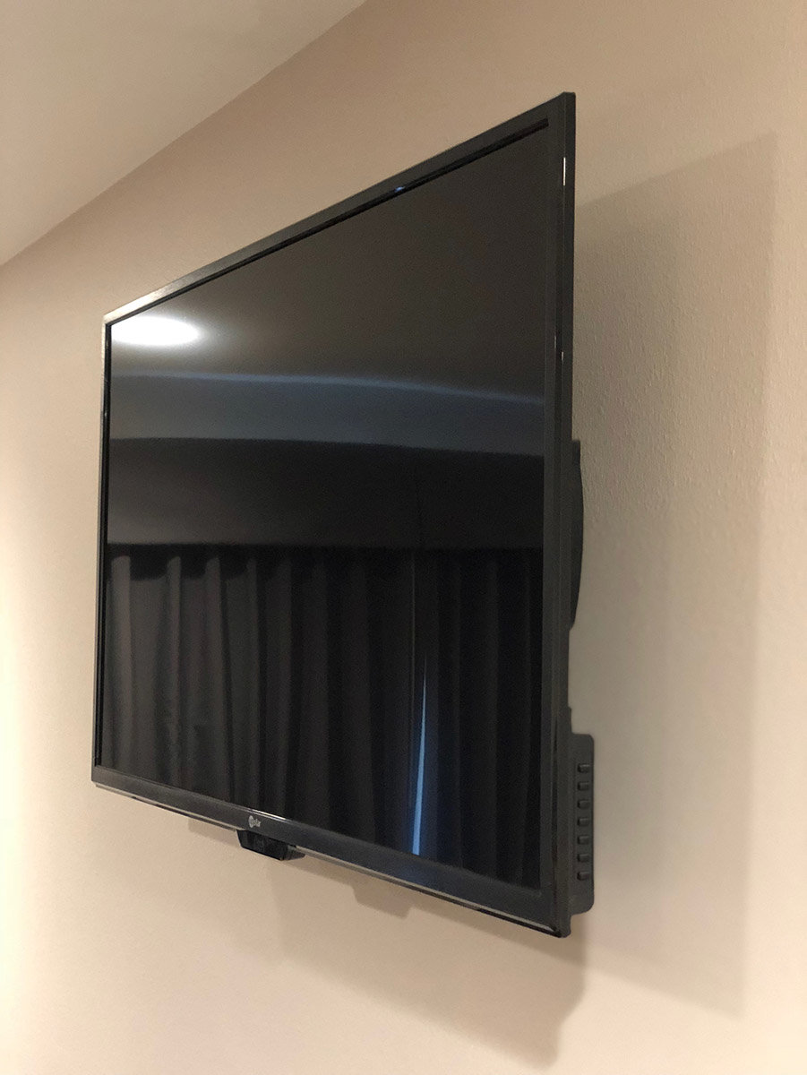 LCD TV hanging on wall