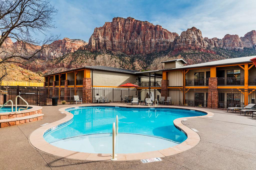 Pool at hotel with mountain looming in background