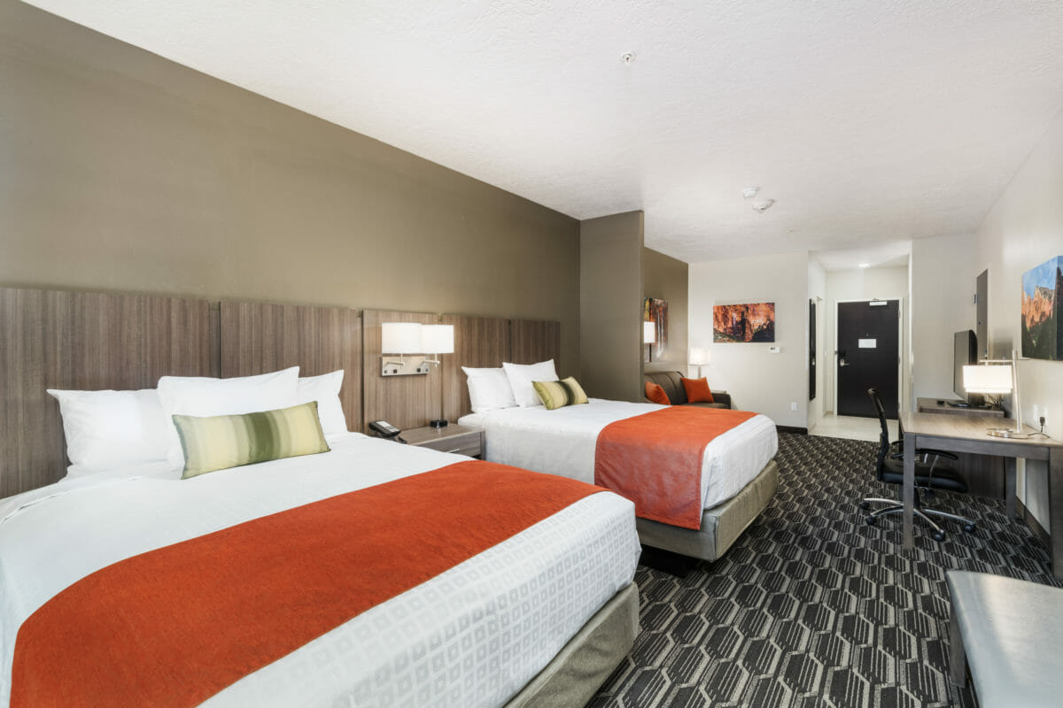 Modern hotel room with two queen beds