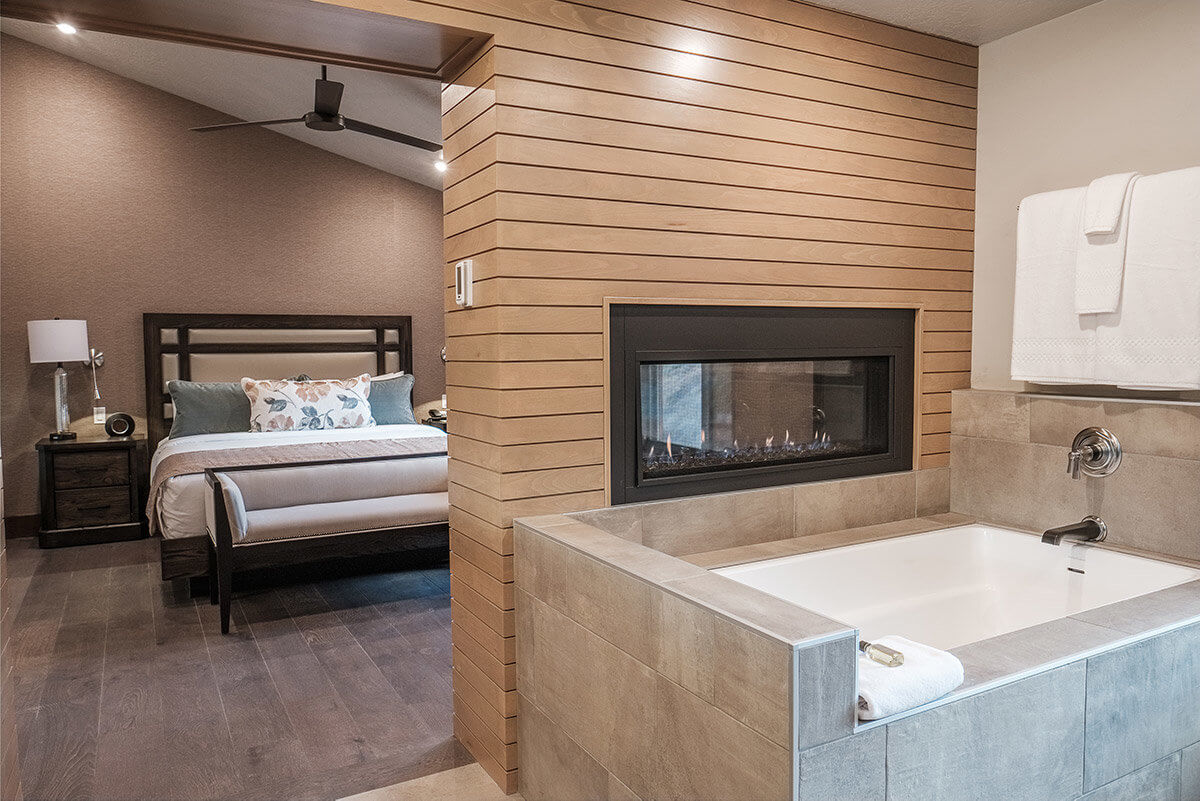 Bathtub with modern fireplace
