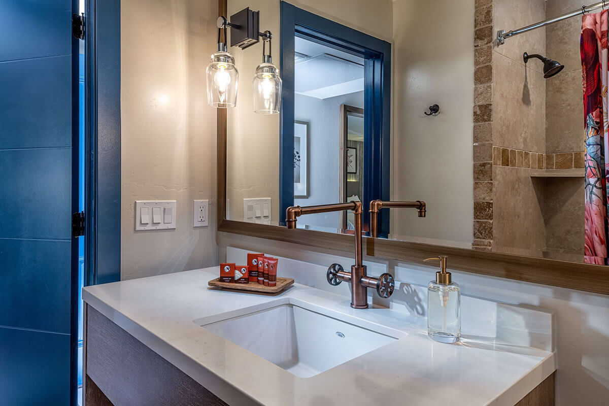 Hotel bathroom with mirror and sink