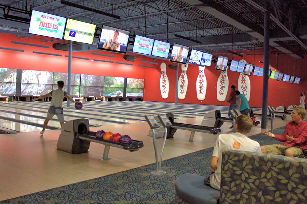 Young people bowling