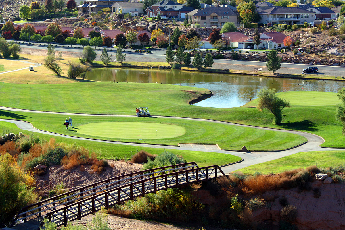 Aerial view of golf course with water