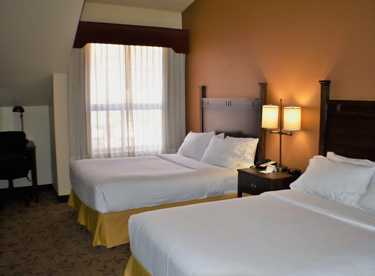 Hotel room with double queen beds