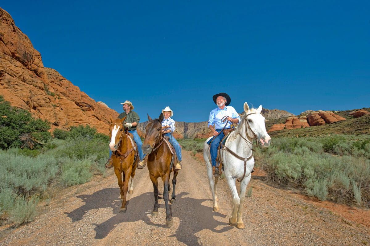 Men horseback riding in Snow Canyon State Park