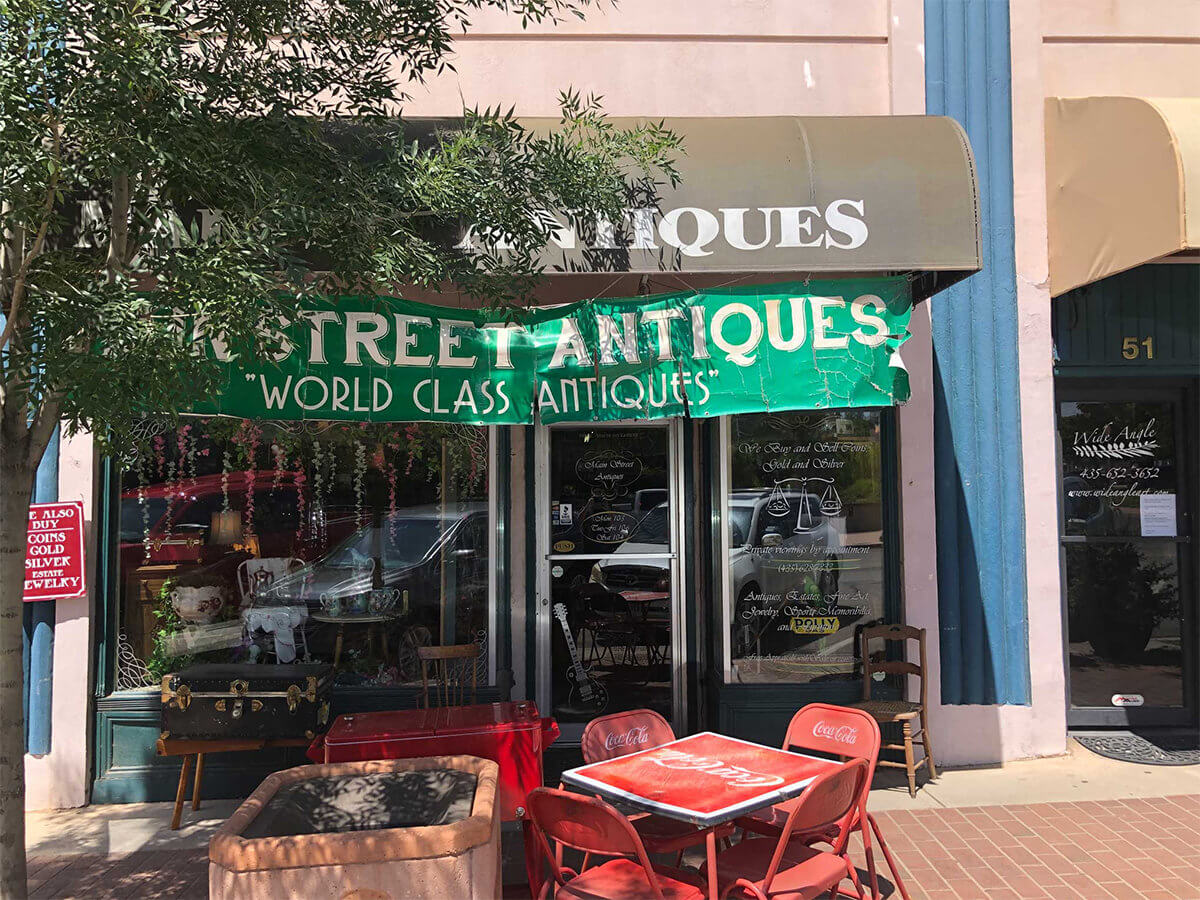 Antique storefront with green banner