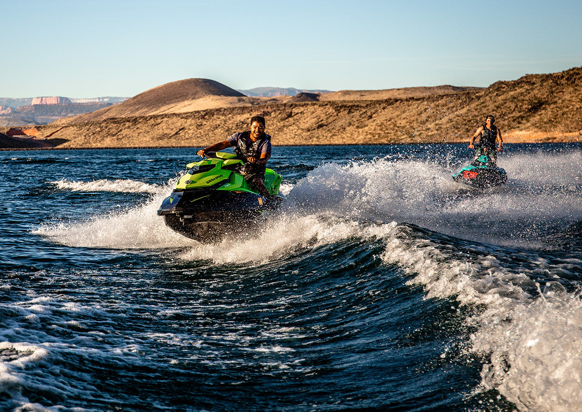 Two men on personal watercrafts